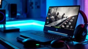 HP Pavilion Gaming Laptop 15z-ec200 on a sleek gaming desk with RGB lighting, displaying a futuristic gaming scene